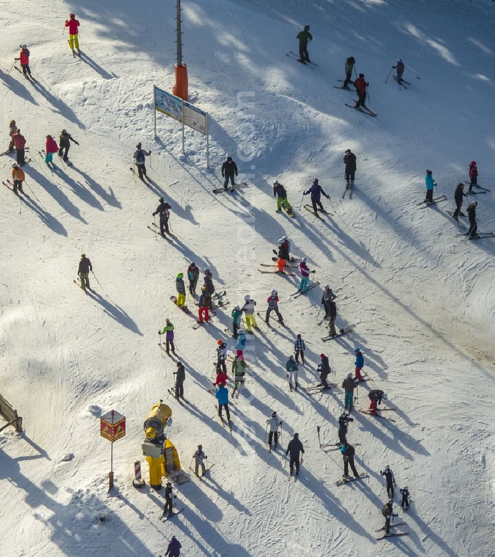 Aerial image Winterberg - Ski lifts of the winter sports area Skiliftkarussell with visitors in Winterberg in the district Hochsauerlandkreis HSK in the state North Rhine-Westphalia