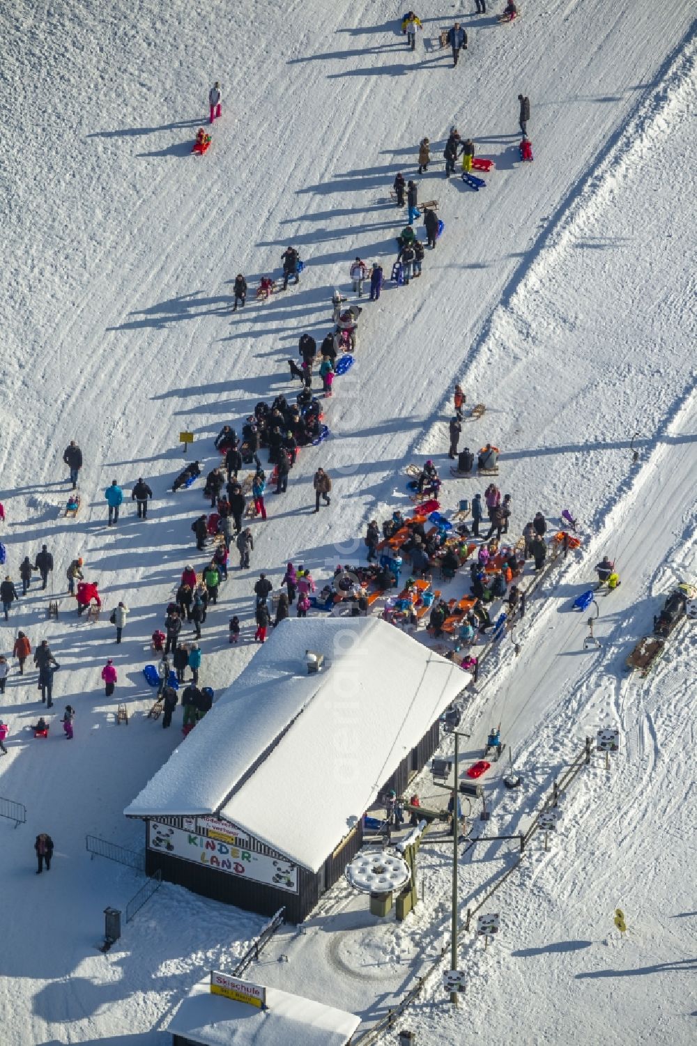 Aerial image Winterberg - Ski lifts of the winter sports area Skiliftkarussell with visitors in Winterberg in the district Hochsauerlandkreis HSK in the state North Rhine-Westphalia