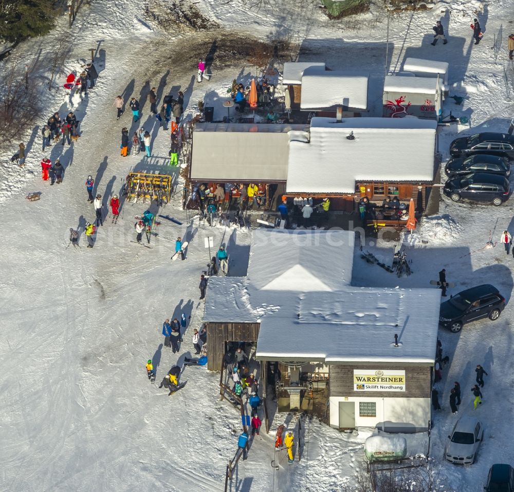 Winterberg from above - Ski lifts of the winter sports area Skiliftkarussell with visitors in Winterberg in the district Hochsauerlandkreis HSK in the state North Rhine-Westphalia