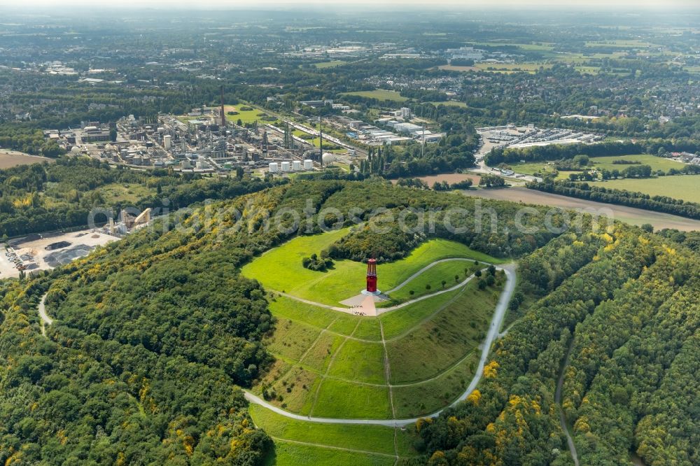 Moers from above - Sculpture of an oversized red miner's lamp on the grounds of renatured Halde Rheinpreussen in Moers in North Rhine-Westphalia