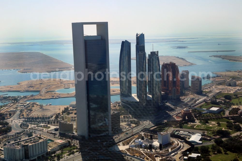 Abu Dhabi from above - City center with the skyline dominated by the new Skyscraper of the ADNOC headquarter and the Etihad Towers in Abu Dhabi in United Arab Emirates