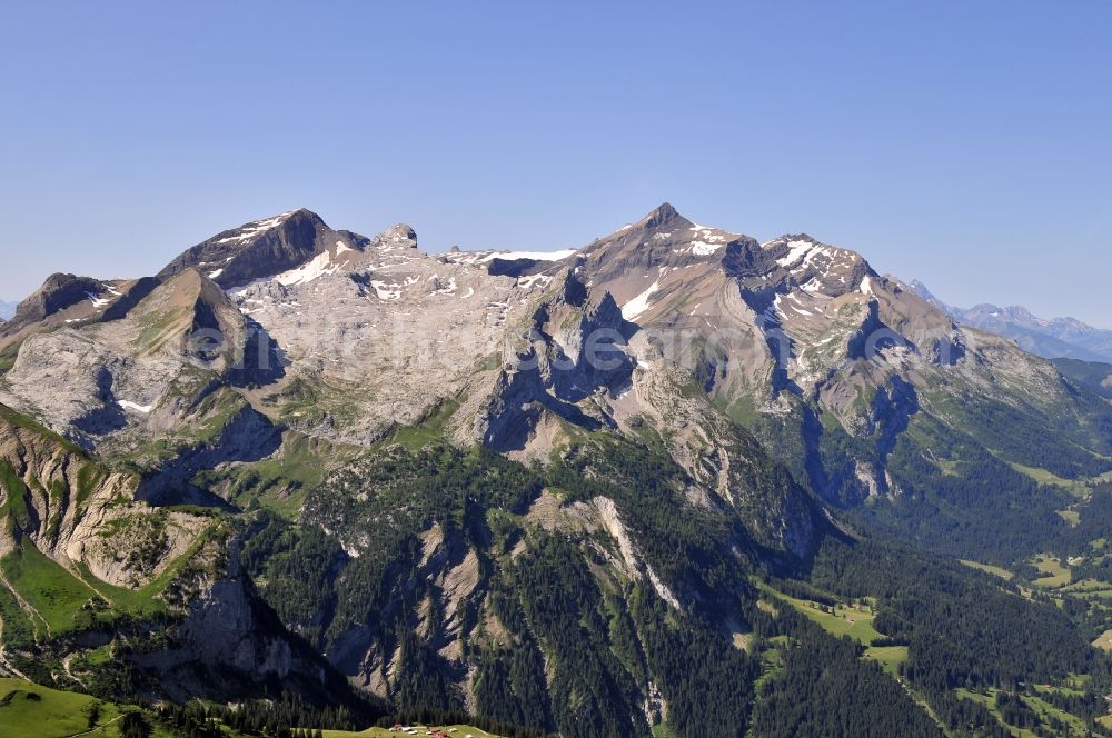 Gsteig from above - Skyline of the mountains Schluchhorn, Sanetschhorn (or Mont Brun) and Oldenhorn in the Bernese Alps, Switzerland. The Oldenhorn is the second highest peak of the massif of the Diablerets and canton of Vaud