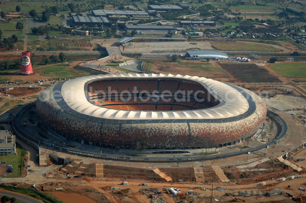 Johannesburg from the bird's eye view: Blick auf das Soccer City Stadion bzw. First-National-Bank-Stadion ( FNB-Stadion ) Johannesburg in der Provinz Gauteng von Südafrika, vor der Fußball- Weltmeisterschaft. Die Dachkonstruktion wurde vom Ingenieurbüro Schlaich, Bergermann und Partner entworfen. View of the Soccer City Stadium in Johannesburg in South Africa for the FIFA World Cup 2010.