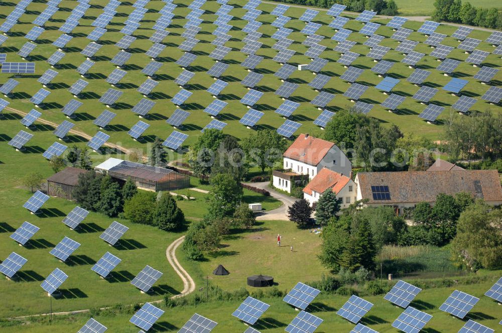 Aerial image Arnstein - Blick auf das Solarfeld Erlasee (auch Solarstrompark Gut Erlasee) einem 2008 auf dem ehemaligen fränkischen Weingut Erlasee bei Arnstein im Landkreis Main-Spessart (Bayern) errichtetes Solarkraftwerk. Es ist ein Gemeinschaftsprojekt des Berliner Solarmodulherstellers Solon SE, des Projektierungs- und Vertriebsunternehmens S.A.G. Solarstrom AG und der E.ON Bayern AG. Jedes Feld ist auf einem drehbaren Untergestell montiert, was eine exakte Ausrichtung der Solarmodule zur Sonne hin ermöglicht. View of the solar field Erlasee (solar Park Good Erlasee) a 2008 on the former Frankish at Weingut Erlasee Arnstein in the district Main-Spessart (Bavaria) built solar power plant.