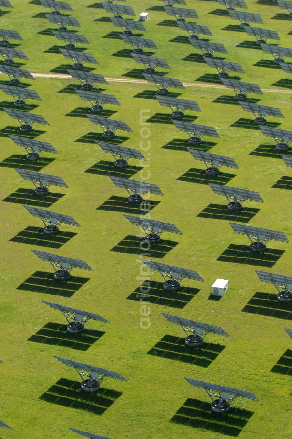 Aerial image Arnstein - Blick auf das Solarfeld Erlasee (auch Solarstrompark Gut Erlasee) einem 2008 auf dem ehemaligen fränkischen Weingut Erlasee bei Arnstein im Landkreis Main-Spessart (Bayern) errichtetes Solarkraftwerk. Es ist ein Gemeinschaftsprojekt des Berliner Solarmodulherstellers Solon SE, des Projektierungs- und Vertriebsunternehmens S.A.G. Solarstrom AG und der E.ON Bayern AG. Jedes Feld ist auf einem drehbaren Untergestell montiert, was eine exakte Ausrichtung der Solarmodule zur Sonne hin ermöglicht. View of the solar field Erlasee (solar Park Good Erlasee) a 2008 on the former Frankish at Weingut Erlasee Arnstein in the district Main-Spessart (Bavaria) built solar power plant.