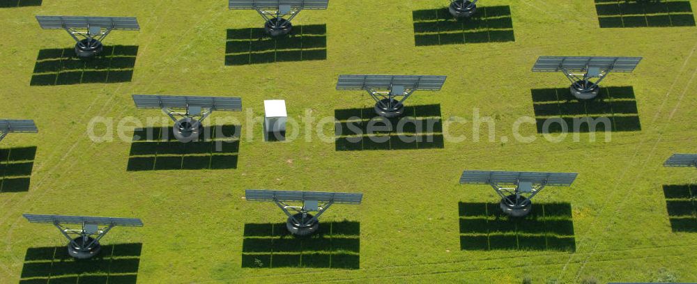 Aerial image Arnstein - Blick auf das Solarfeld Erlasee (auch Solarstrompark Gut Erlasee) einem 2008 auf dem ehemaligen fränkischen Weingut Erlasee bei Arnstein im Landkreis Main-Spessart (Bayern) errichtetes Solarkraftwerk. Es ist ein Gemeinschaftsprojekt des Berliner Solarmodulherstellers Solon SE, des Projektierungs- und Vertriebsunternehmens S.A.G. Solarstrom AG und der E.ON Bayern AG. Jedes Feld ist auf einem drehbaren Untergestell montiert, was eine exakte Ausrichtung der Solarmodule zur Sonne hin ermöglicht. View of the solar field Erlasee (solar Park Good Erlasee) a 2008 on the former Frankish at Weingut Erlasee Arnstein in the district Main-Spessart (Bavaria) built solar power plant.