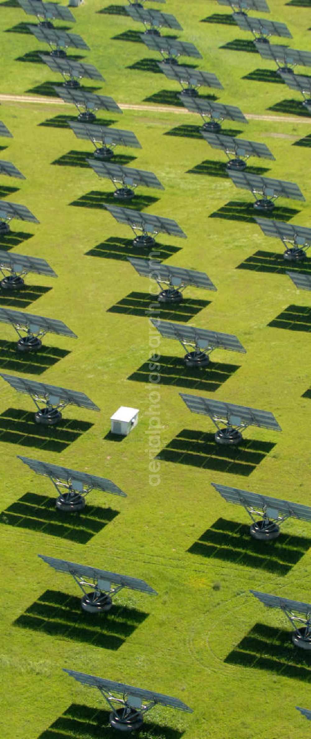 Aerial photograph Arnstein - Blick auf das Solarfeld Erlasee (auch Solarstrompark Gut Erlasee) einem 2008 auf dem ehemaligen fränkischen Weingut Erlasee bei Arnstein im Landkreis Main-Spessart (Bayern) errichtetes Solarkraftwerk. Es ist ein Gemeinschaftsprojekt des Berliner Solarmodulherstellers Solon SE, des Projektierungs- und Vertriebsunternehmens S.A.G. Solarstrom AG und der E.ON Bayern AG. Jedes Feld ist auf einem drehbaren Untergestell montiert, was eine exakte Ausrichtung der Solarmodule zur Sonne hin ermöglicht. View of the solar field Erlasee (solar Park Good Erlasee) a 2008 on the former Frankish at Weingut Erlasee Arnstein in the district Main-Spessart (Bavaria) built solar power plant.