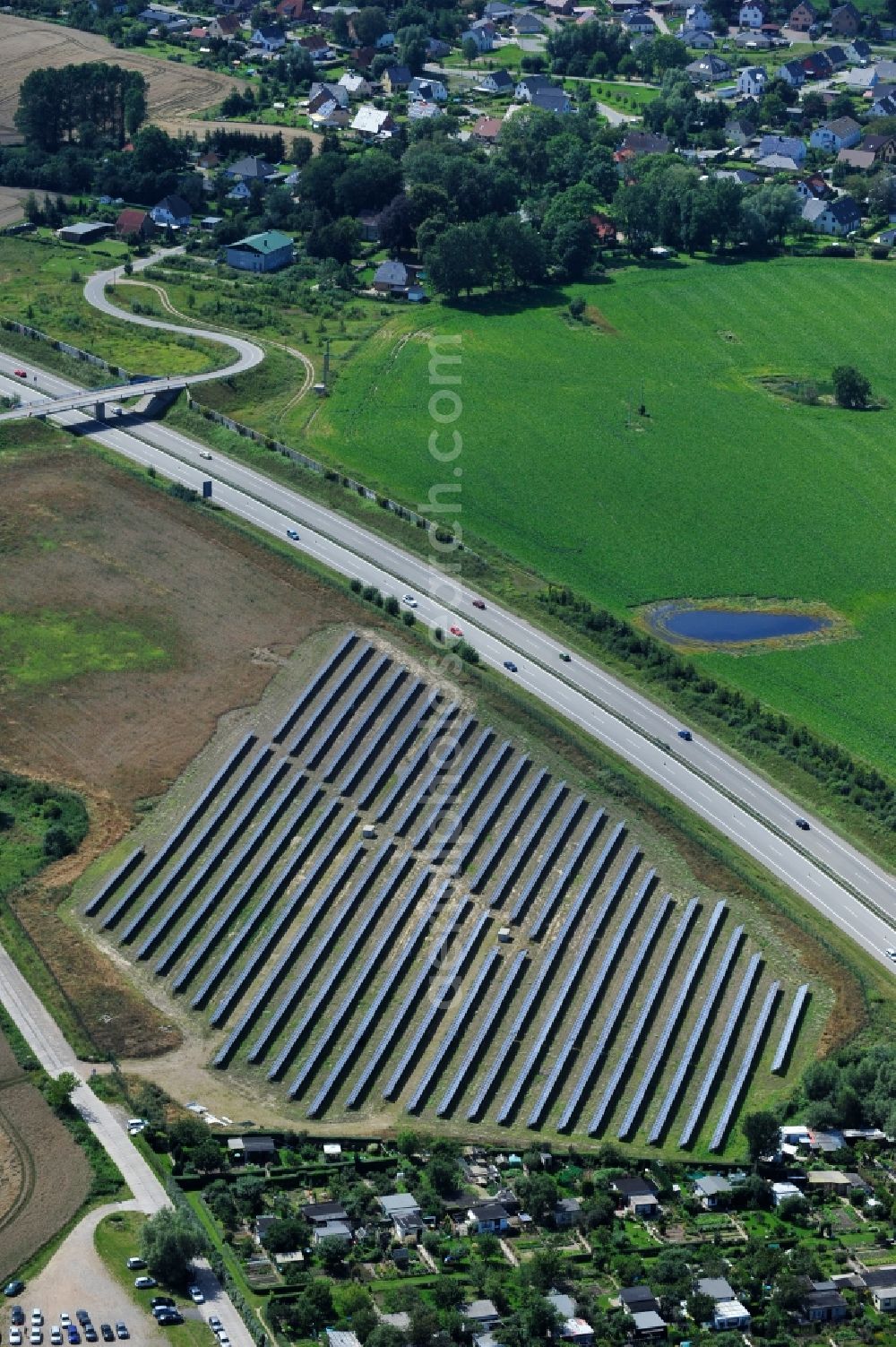 Aerial image Rostock - Solar panel Solar power plant on the motorway A 103 motorway near Rostock in Mecklenburg-Vorpommern