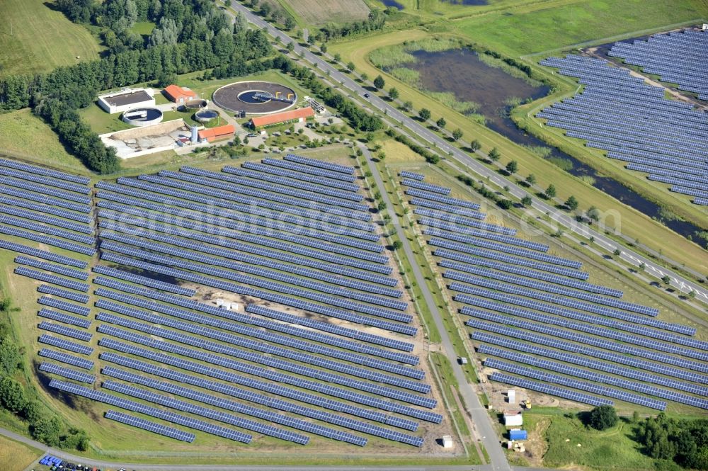 Aerial image Boizenburg - Boizenburg 08/07/2012 Newly built solar panel, photovoltaic solar park or along the road 5 on the industrial and commercial area of the eastern edge of Boizenburg / Elbe. The plant operator is the EEPro Company