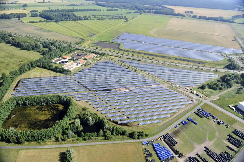 Aerial image Boizenburg - Boizenburg 08/07/2012 Newly built solar panel, photovoltaic solar park or along the road 5 on the industrial and commercial area of the eastern edge of Boizenburg / Elbe. The plant operator is the EEPro Company