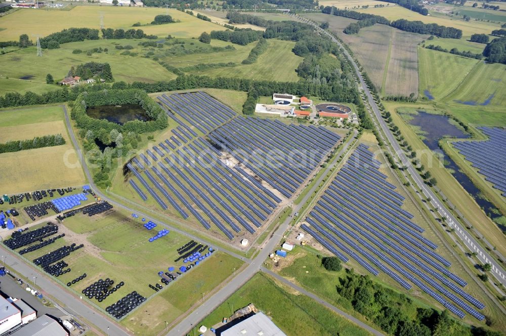 Aerial photograph Boizenburg - Boizenburg 08/07/2012 Newly built solar panel, photovoltaic solar park or along the road 5 on the industrial and commercial area of the eastern edge of Boizenburg / Elbe. The plant operator is the EEPro Company