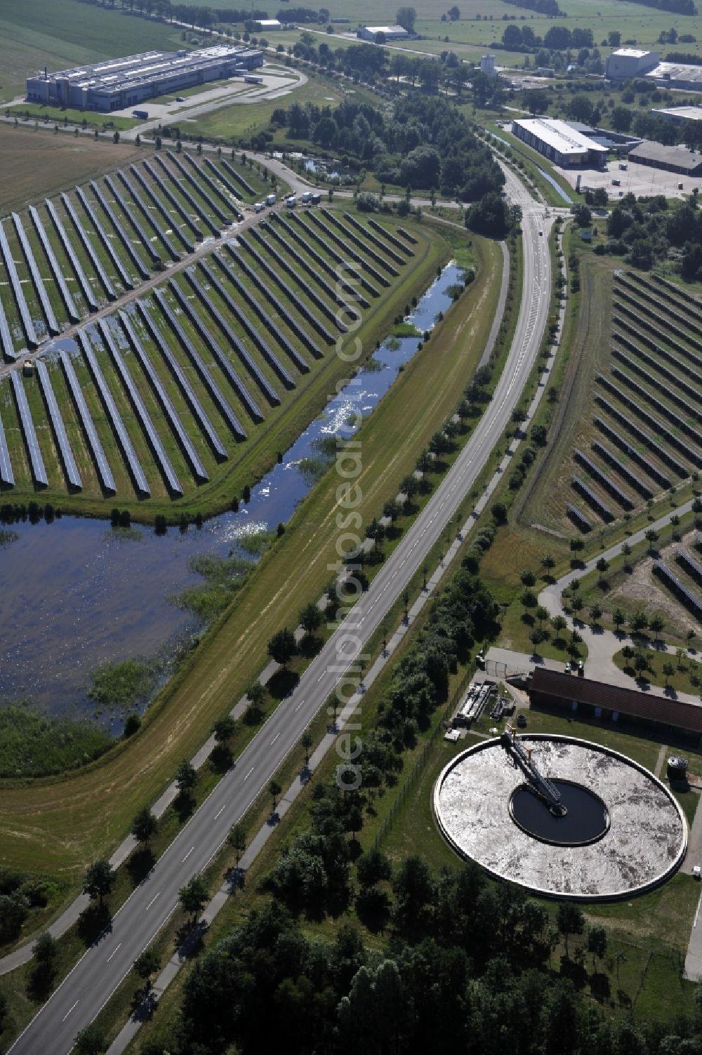 Aerial photograph Boizenburg - Boizenburg 08/07/2012 Newly built solar panel, photovoltaic solar park or along the road 5 on the industrial and commercial area of the eastern edge of Boizenburg / Elbe. The plant operator is the EEPro Company