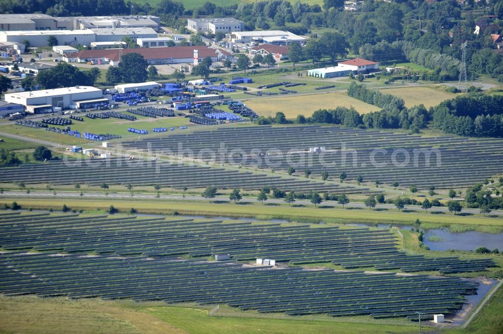 Aerial image Boizenburg - Boizenburg 08/07/2012 Newly built solar panel, photovoltaic solar park or along the road 5 on the industrial and commercial area of the eastern edge of Boizenburg / Elbe. The plant operator is the EEPro Company