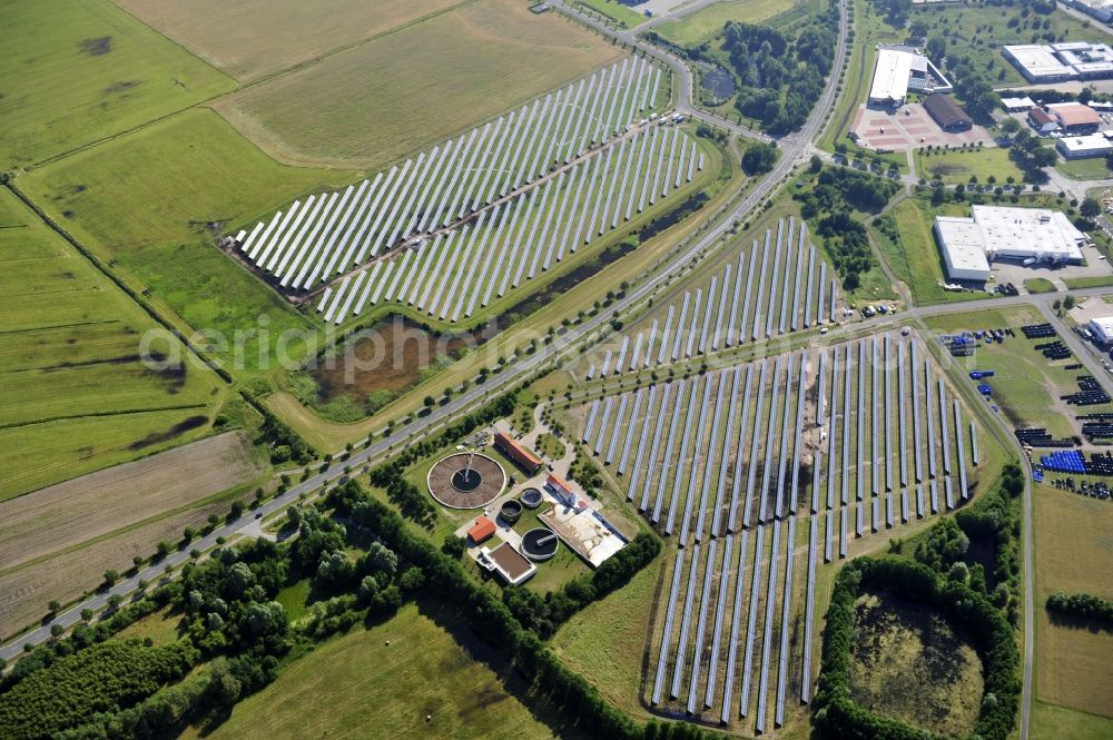 Aerial image Boizenburg - Boizenburg 08/07/2012 Newly built solar panel, photovoltaic solar park or along the road 5 on the industrial and commercial area of the eastern edge of Boizenburg / Elbe. The plant operator is the EEPro Company