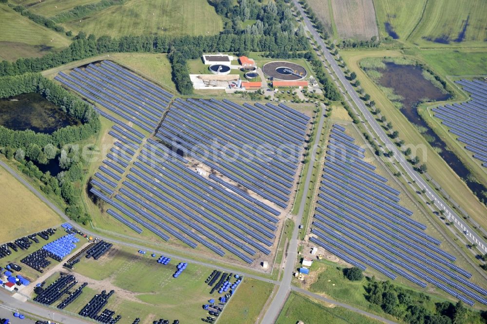 Aerial image Boizenburg - Boizenburg 08/07/2012 Newly built solar panel, photovoltaic solar park or along the road 5 on the industrial and commercial area of the eastern edge of Boizenburg / Elbe. The plant operator is the EEPro Company