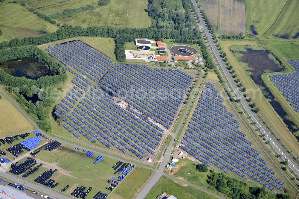 Aerial photograph Boizenburg - Boizenburg 08/07/2012 Newly built solar panel, photovoltaic solar park or along the road 5 on the industrial and commercial area of the eastern edge of Boizenburg / Elbe. The plant operator is the EEPro Company