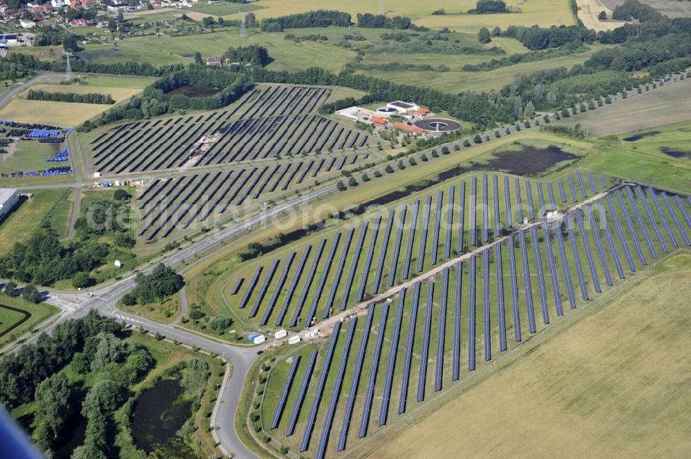 Aerial image Boizenburg - Boizenburg 08/07/2012 Newly built solar panel, photovoltaic solar park or along the road 5 on the industrial and commercial area of the eastern edge of Boizenburg / Elbe. The plant operator is the EEPro Company