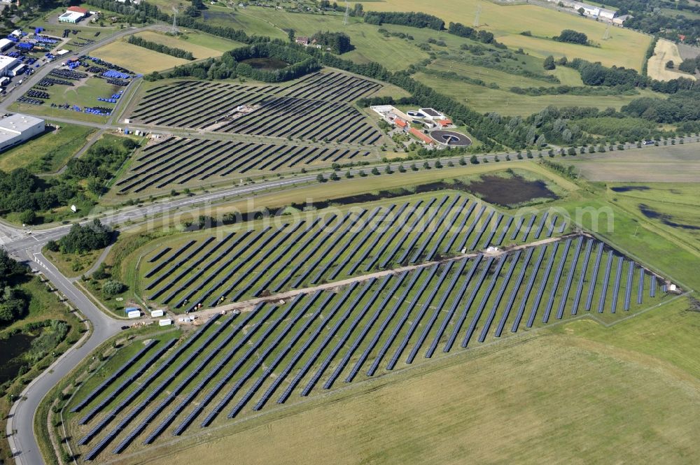 Aerial image Boizenburg - Boizenburg 08/07/2012 Newly built solar panel, photovoltaic solar park or along the road 5 on the industrial and commercial area of the eastern edge of Boizenburg / Elbe. The plant operator is the EEPro Company