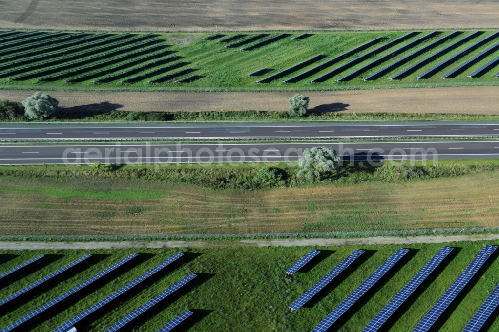 Kuckuck from above - Solar fields of photovoltaic power plant along the course of the A24 motorway at Kuckuk in Brandenburg