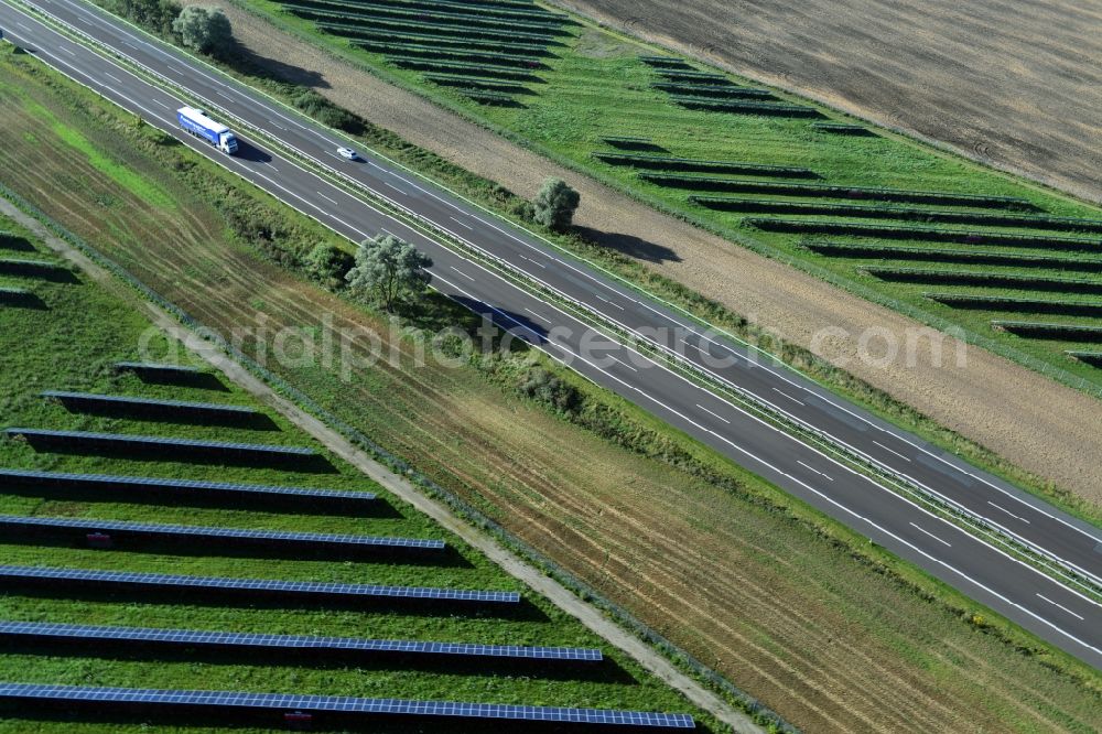 Aerial image Kuckuck - Solar fields of photovoltaic power plant along the course of the A24 motorway at Kuckuk in Brandenburg