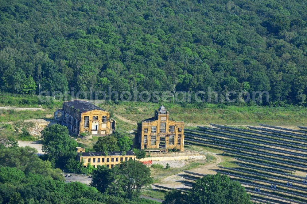 Aerial image Muldenstein - Photovoltaic systems at the solar power plant on the facade ruins of the old pipe plant Muldenstein in the state of Saxony-Anhalt