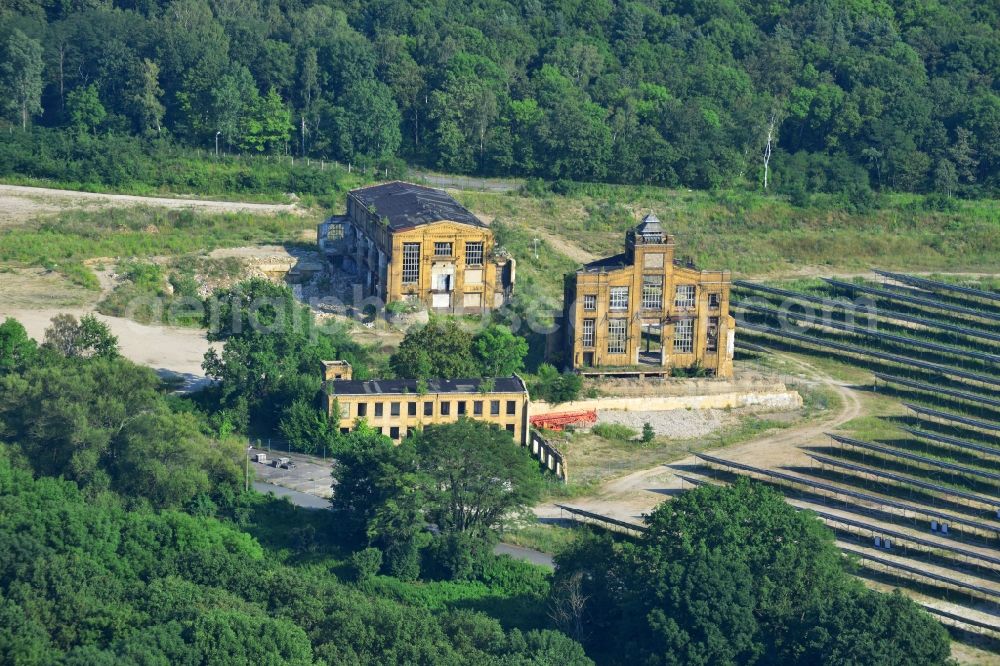 Aerial photograph Muldenstein - Photovoltaic systems at the solar power plant on the facade ruins of the old pipe plant Muldenstein in the state of Saxony-Anhalt