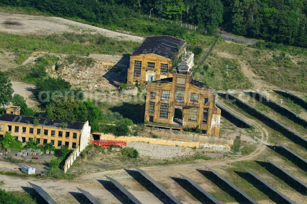 Muldenstein from above - Photovoltaic systems at the solar power plant on the facade ruins of the old pipe plant Muldenstein in the state of Saxony-Anhalt