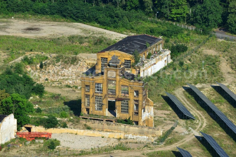 Aerial image Muldenstein - Photovoltaic systems at the solar power plant on the facade ruins of the old pipe plant Muldenstein in the state of Saxony-Anhalt