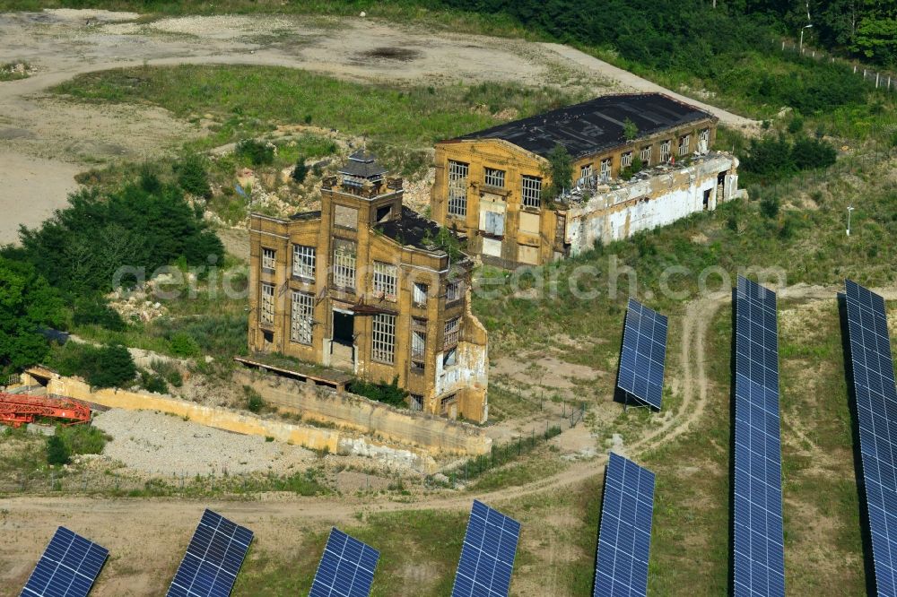 Aerial photograph Muldenstein - Photovoltaic systems at the solar power plant on the facade ruins of the old pipe plant Muldenstein in the state of Saxony-Anhalt