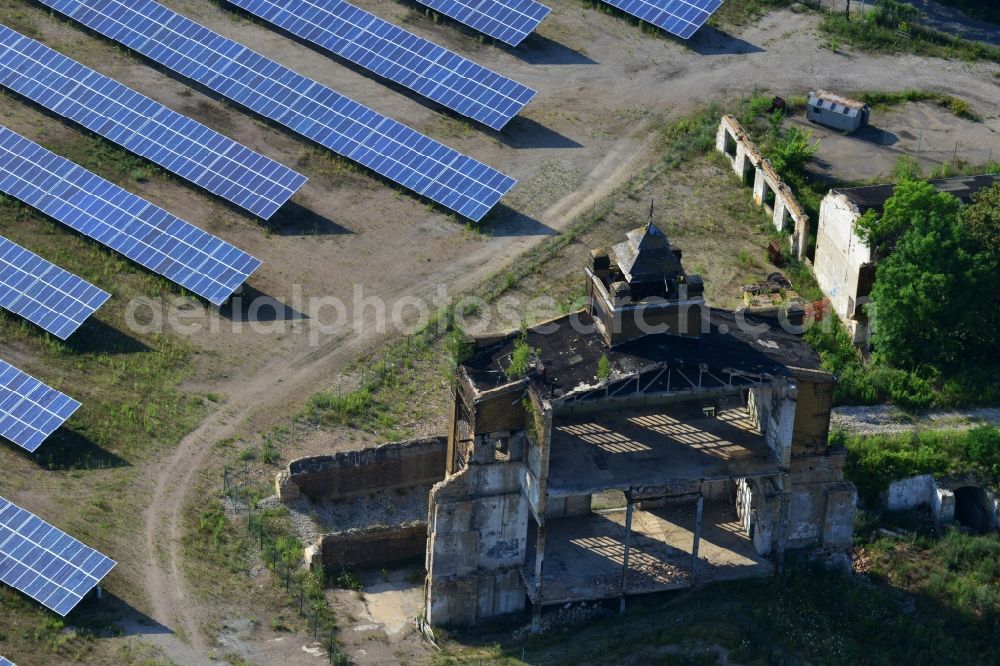 Muldenstein from above - Photovoltaic systems at the solar power plant on the facade ruins of the old pipe plant Muldenstein in the state of Saxony-Anhalt