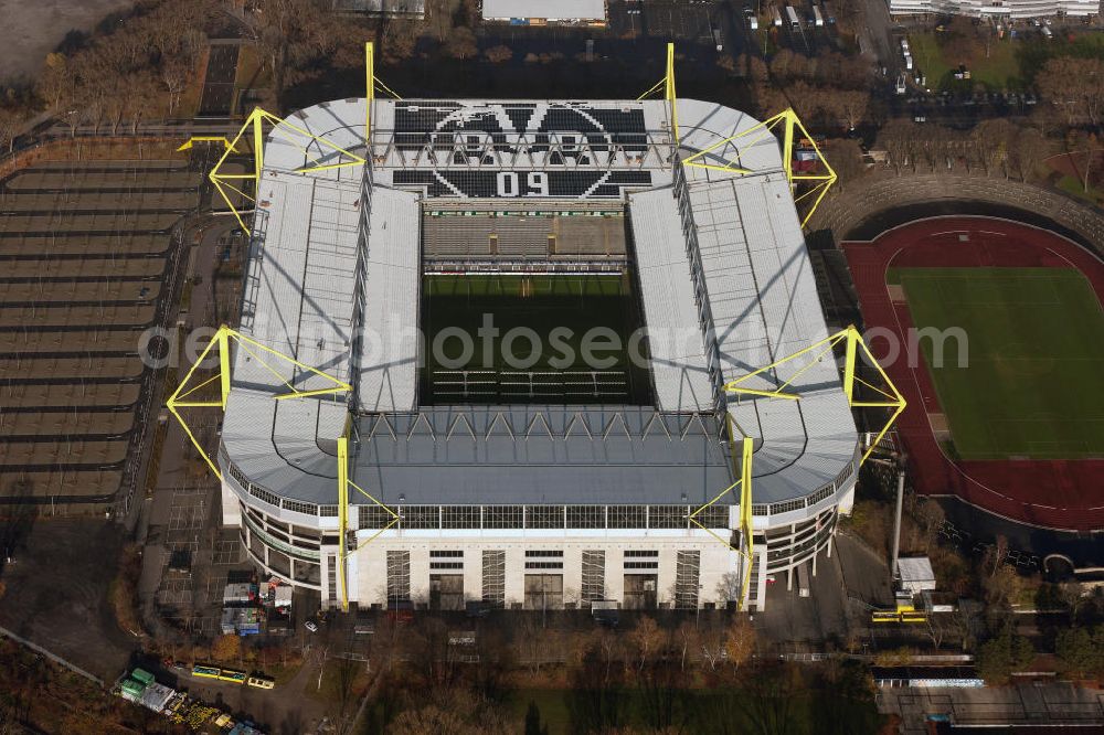 Dortmund from above - Mit Solarpaneelen / Solarflächen als BVB - Logo aufgerüstetes Dach des Borusseum , dem Stadion Signal Iduna Park des BVB. With solar panels as BVB - logo has been upgraded roof of Borusseum, the Signal Iduna Park stadium of Borussia Dortmund.