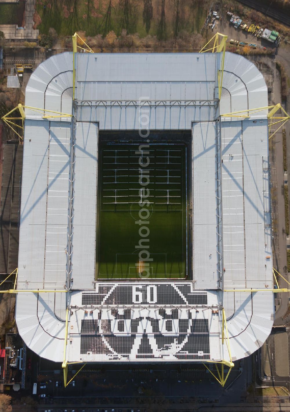 Aerial photograph Dortmund - Mit Solarpaneelen / Solarflächen als BVB - Logo aufgerüstetes Dach des Borusseum , dem Stadion Signal Iduna Park des BVB. With solar panels as BVB - logo has been upgraded roof of Borusseum, the Signal Iduna Park stadium of Borussia Dortmund.