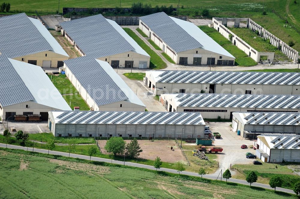 Aerial image Kloster Veßra - Solar power plant on the roofs of agricultural buildings