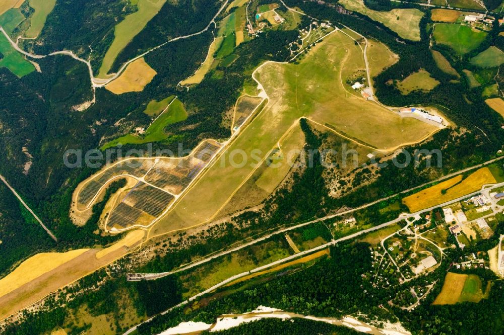 Aspres-sur-Buëch from above - Solar power plant and photovoltaic systems on the airfield in Aspres-sur-Buech in Provence-Alpes-Cote d'Azur, France