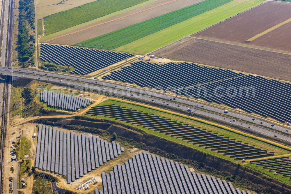 Aerial image Bedburg - Solar power plant and photovoltaic systems on the A44 road in Bedburg in the state of North Rhine-Westphalia, Germany