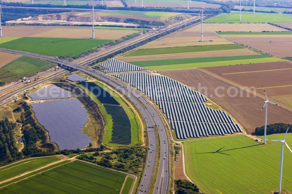 Aerial image Bedburg - Solar power plant and photovoltaic systems on the A44 road in Bedburg in the state of North Rhine-Westphalia, Germany