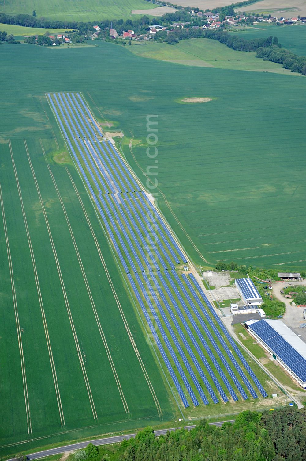 Aerial photograph Dedelow - Solar power plant and photovoltaic systems on the former runway with the tarmac area of the airfield in Dedelow in the state Brandenburg, Germany