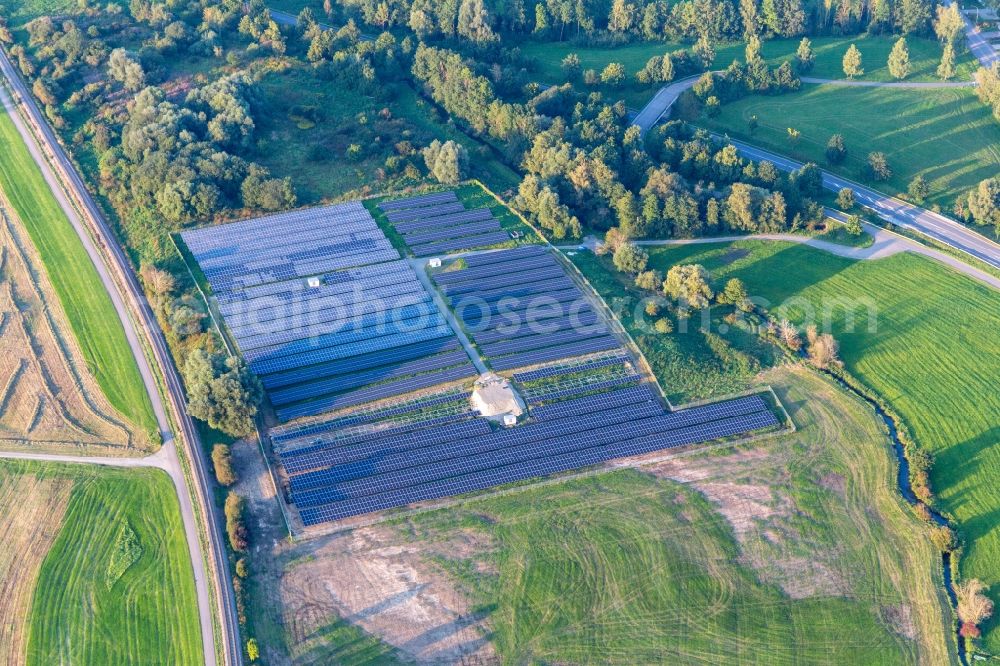 Ertingen from the bird's eye view: Rows of panels of a solar power plant and photovoltaic system on a field in Ertingen in the state Baden-Wuerttemberg, Germany