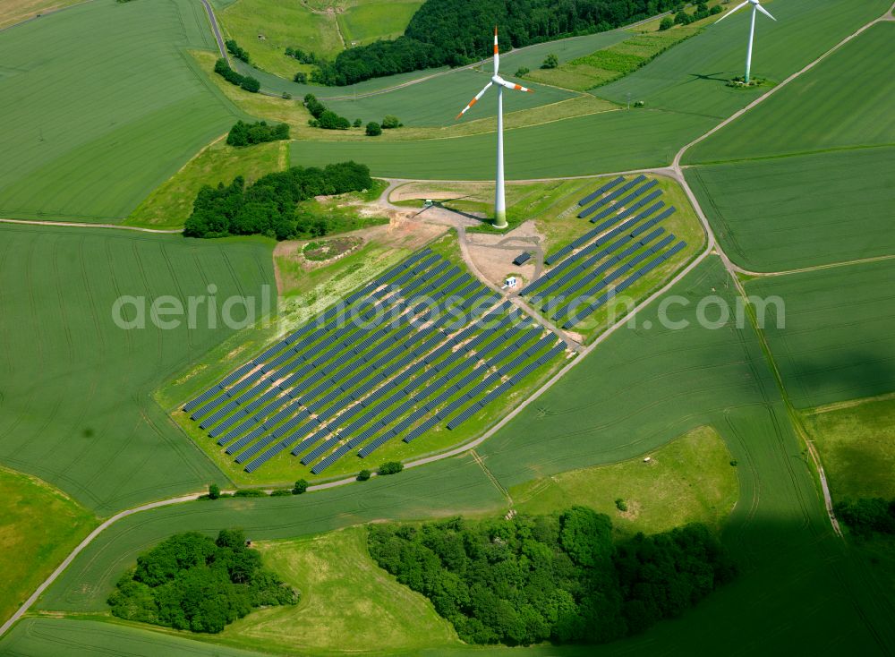 Gerbach from above - Rows of panels of a solar power plant and photovoltaic system on a field in Gerbach in the state Rhineland-Palatinate, Germany