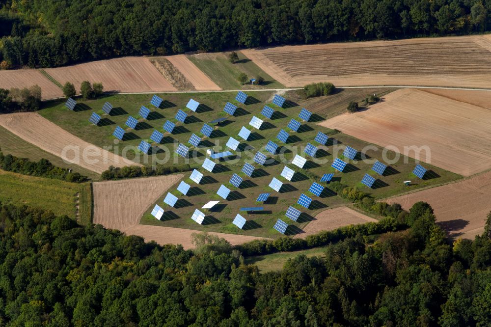 Aerial image Gräfendorf - Rows of panels of a solar power plant and photovoltaic system on a field in Gräfendorf in the state Bavaria, Germany