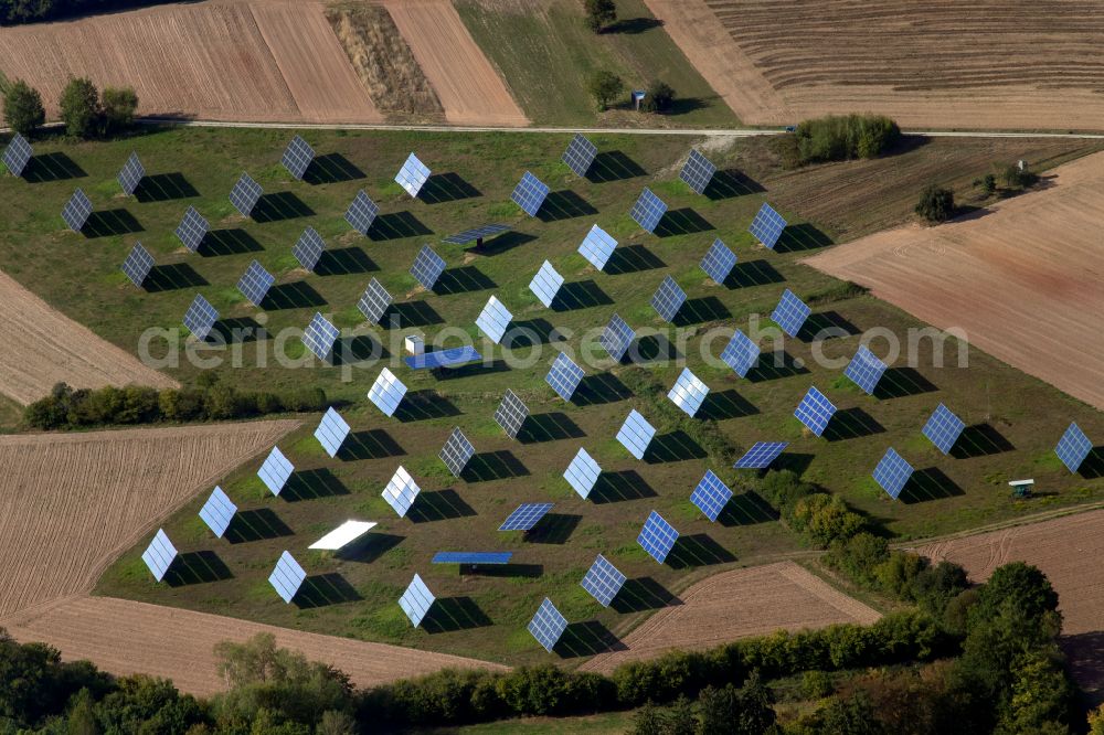 Aerial photograph Gräfendorf - Rows of panels of a solar power plant and photovoltaic system on a field in Gräfendorf in the state Bavaria, Germany