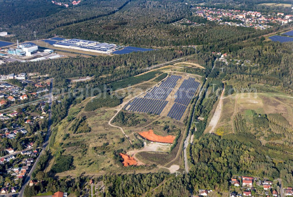 Aerial image Lauta - Rows of panels of a solar power plant and photovoltaic system on a field on street Bahnhofstrasse in Lauta in the state Saxony, Germany