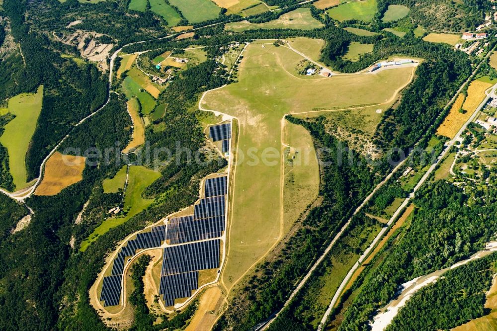 Aerial image Aspres-sur-Buëch - Solar power plant and photovoltaic systems on the airfield in Aspres-sur-Buech in Provence-Alpes-Cote d'Azur, France