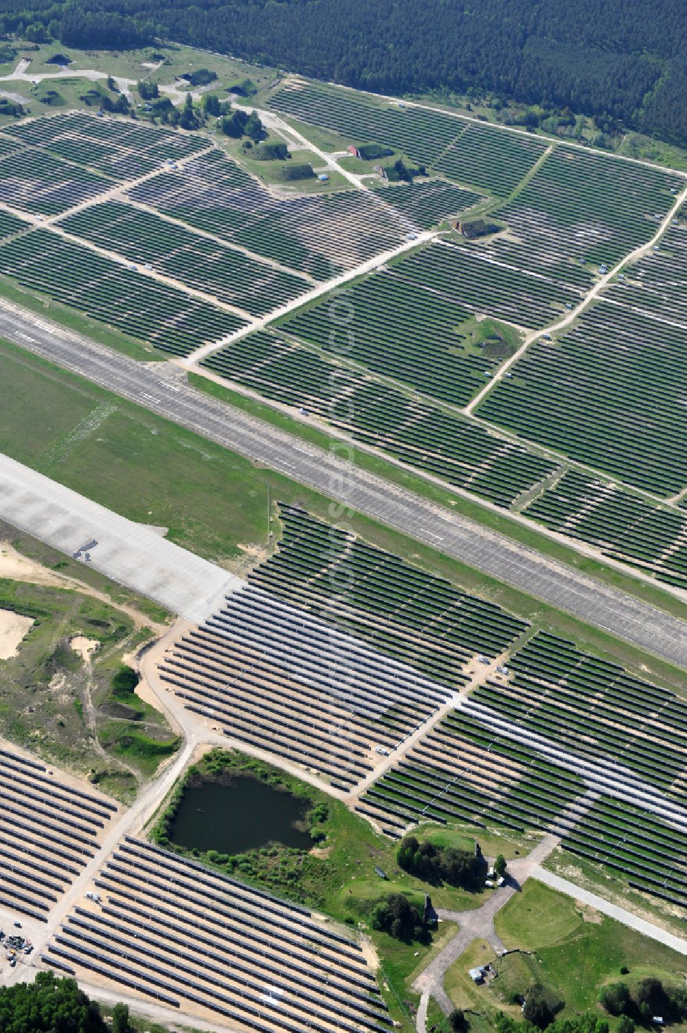 Eberswalde from the bird's eye view: Solar power plant and photovoltaic systems on the airfield in the district Finow in Eberswalde in the state Brandenburg, Germany