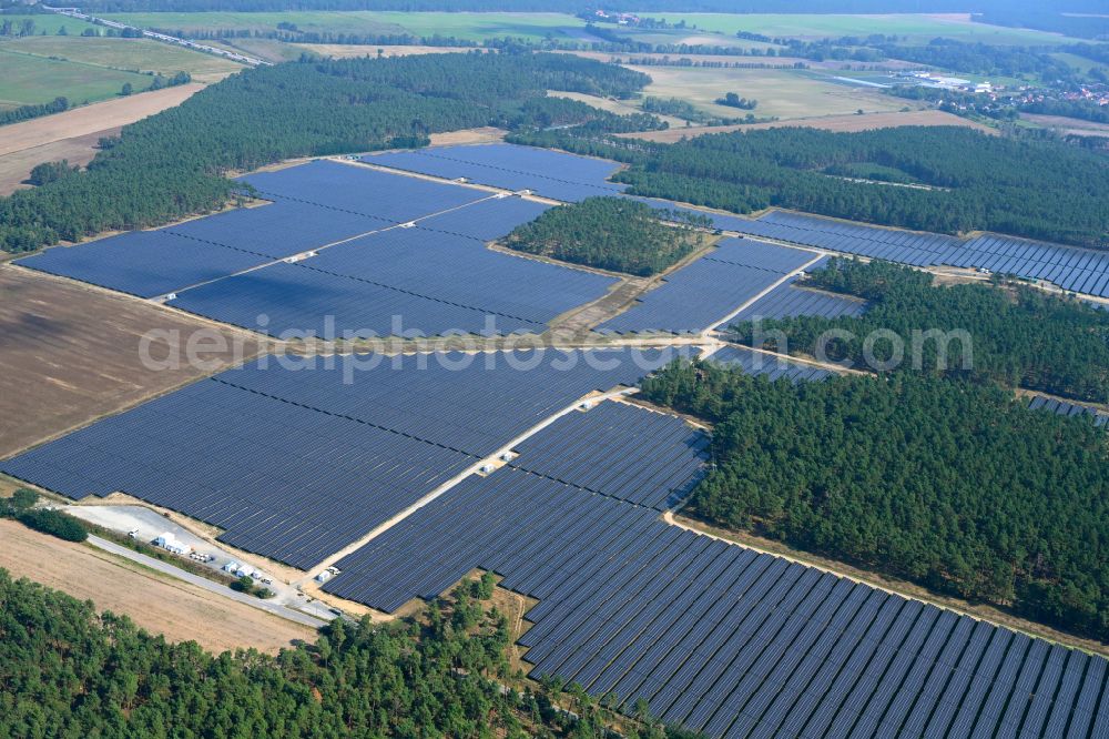 Aerial image Schiebsdorf - Solar power plant and photovoltaic systems in a forest area in Schiebsdorf in the state Brandenburg, Germany