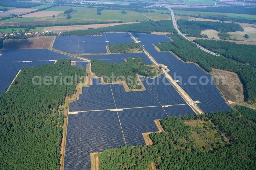 Schiebsdorf from above - Solar power plant and photovoltaic systems in a forest area in Schiebsdorf in the state Brandenburg, Germany