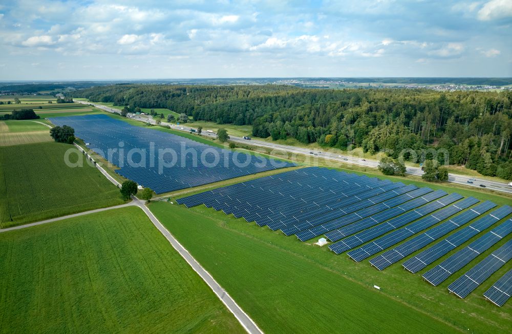 Altenstadt from above - Photovoltaic system and solar power plant - rows of panels on the edge of the lanes of the motorway route and route of the BAB A 81 in Altenstadt Unterallgaeu in the state Bavaria, Germany