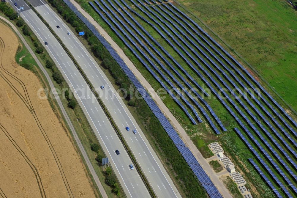 Aerial photograph Rüdersdorf - Solar panels of the solar power plant along the motorway E4 motorway - A40 at Ruedersdorf in Thuringia