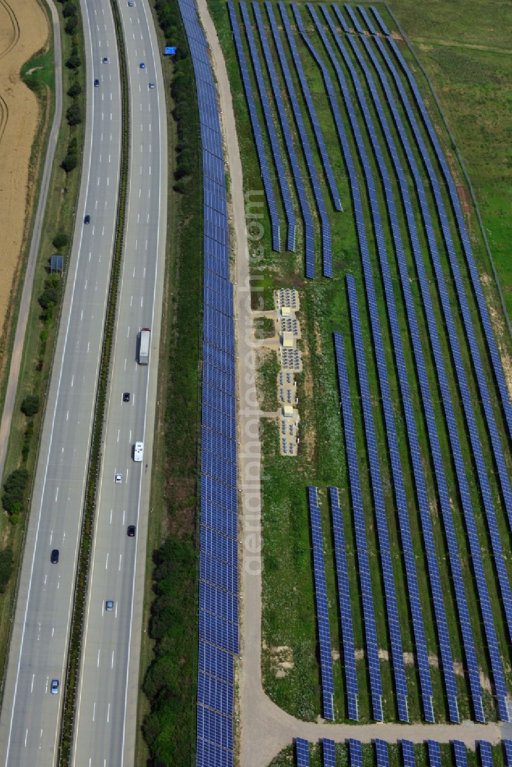 Aerial image Rüdersdorf - Solar panels of the solar power plant along the motorway E4 motorway - A40 at Ruedersdorf in Thuringia