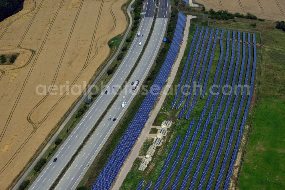 Rüdersdorf from above - Solar panels of the solar power plant along the motorway E4 motorway - A40 at Ruedersdorf in Thuringia